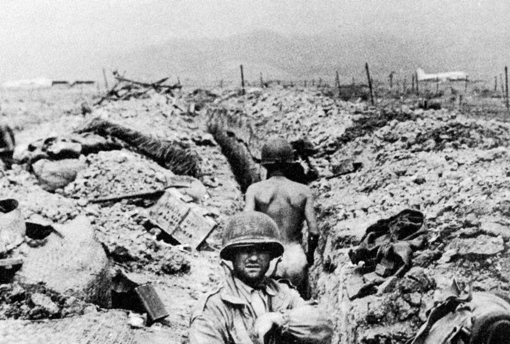 With the Vietminh shelling them from the hazy hills in the distance, the French troops tried to survive in their trenches.