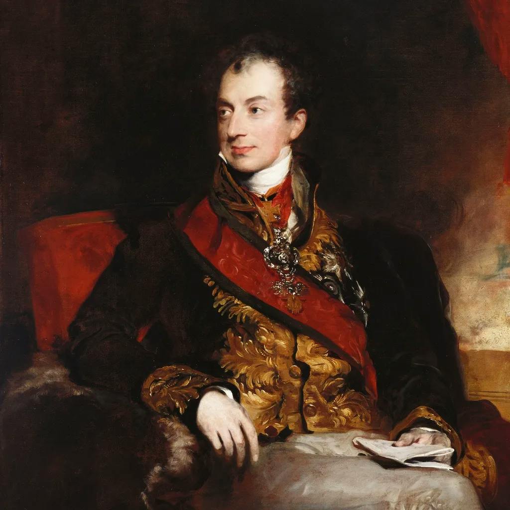 Das Bild zeigt ein Porträt von Klemens von Metternich, gekleidet in eine verzierte Uniform mit Orden und einer breiten Schärpe. Sein Blick ist seitwärts gerichtet, und er ruht eine Hand auf einem Dokument.